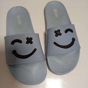Molo light blue smile slides